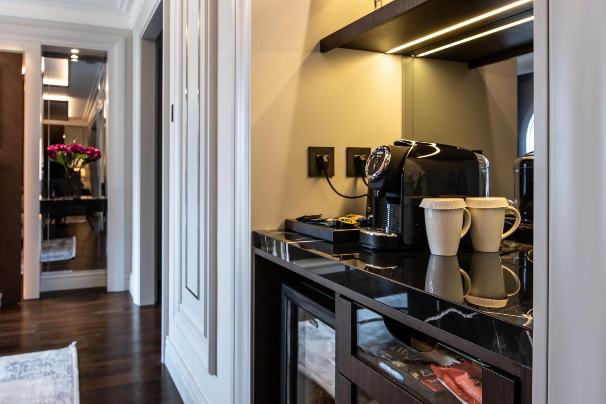 Xheko Imperial Luxury Hotel & Spa 티라나 외부 사진 A Nespresso machine in a hotel room