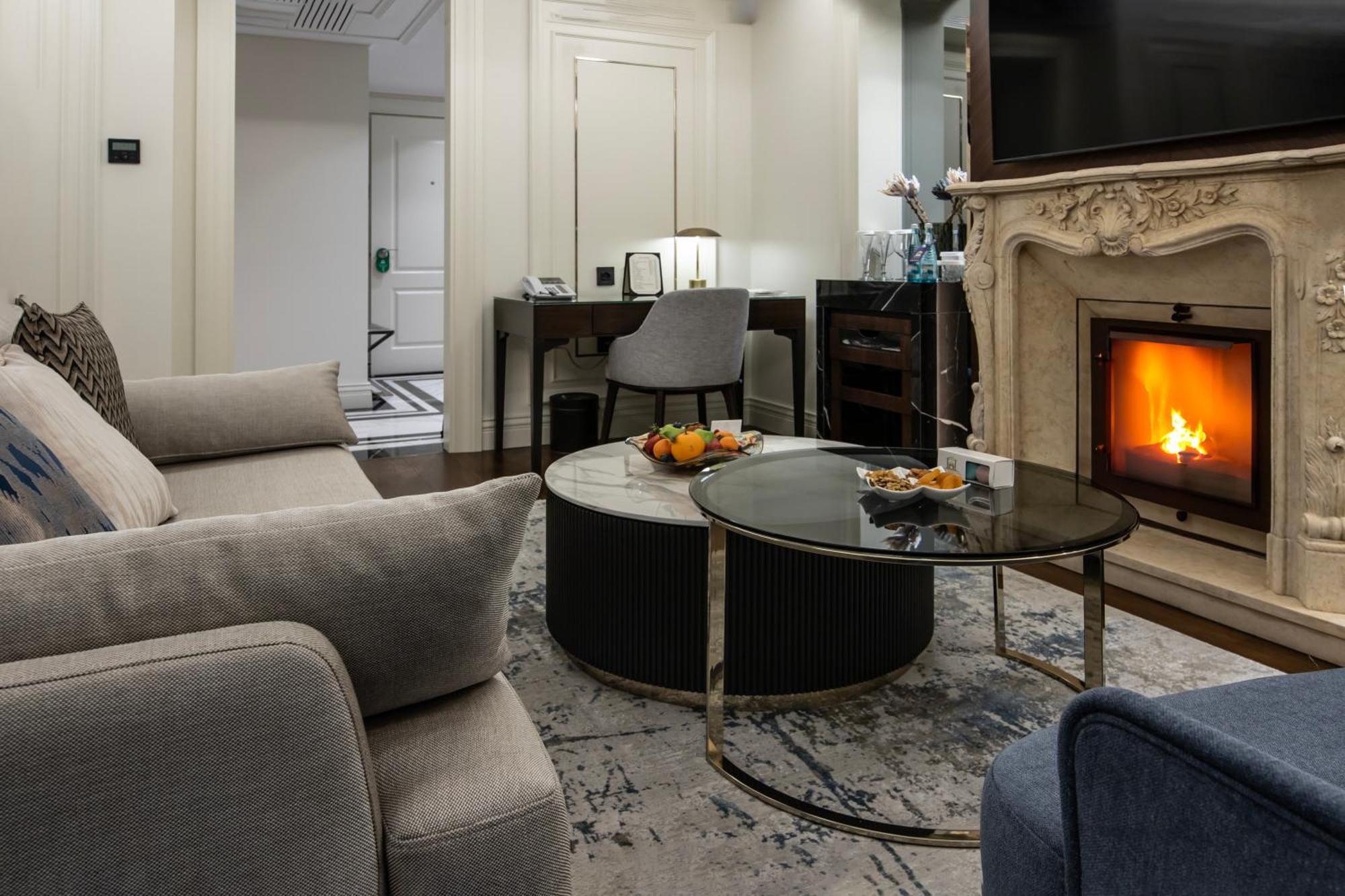 Xheko Imperial Luxury Hotel & Spa 티라나 외부 사진 A living room in a suite at the Ritz-Carlton, Moscow