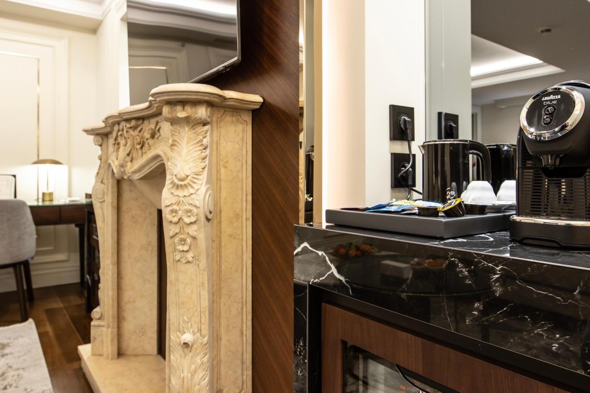 Xheko Imperial Luxury Hotel & Spa 티라나 외부 사진 A Nespresso machine in a hotel room